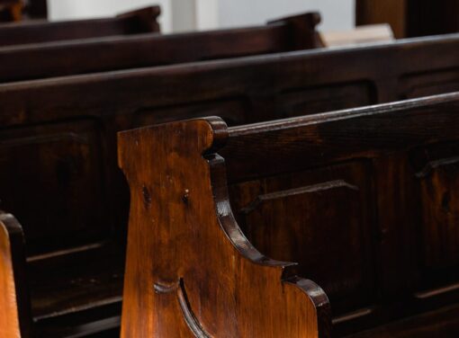 Close up of wooden church pews