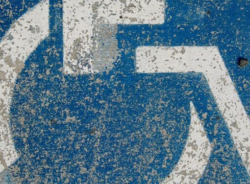 Close up of handicap parking space graphic on concrete