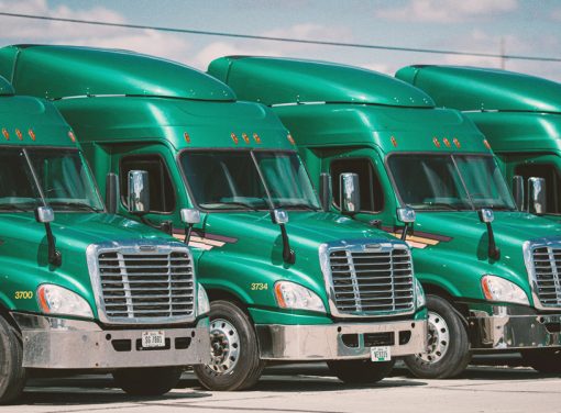 Commercial trucks lined up in a row