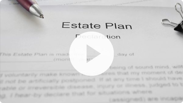 Estate Planning Documents with Pen Laying on Top