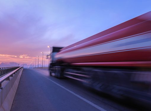 truck zooming up highway