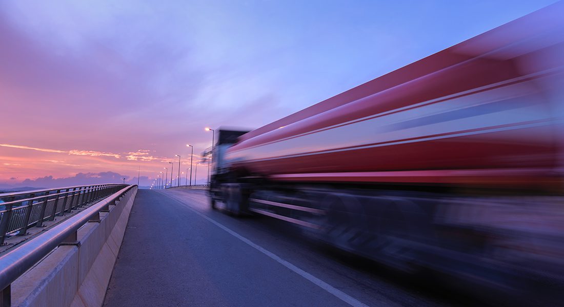 truck zooming up highway