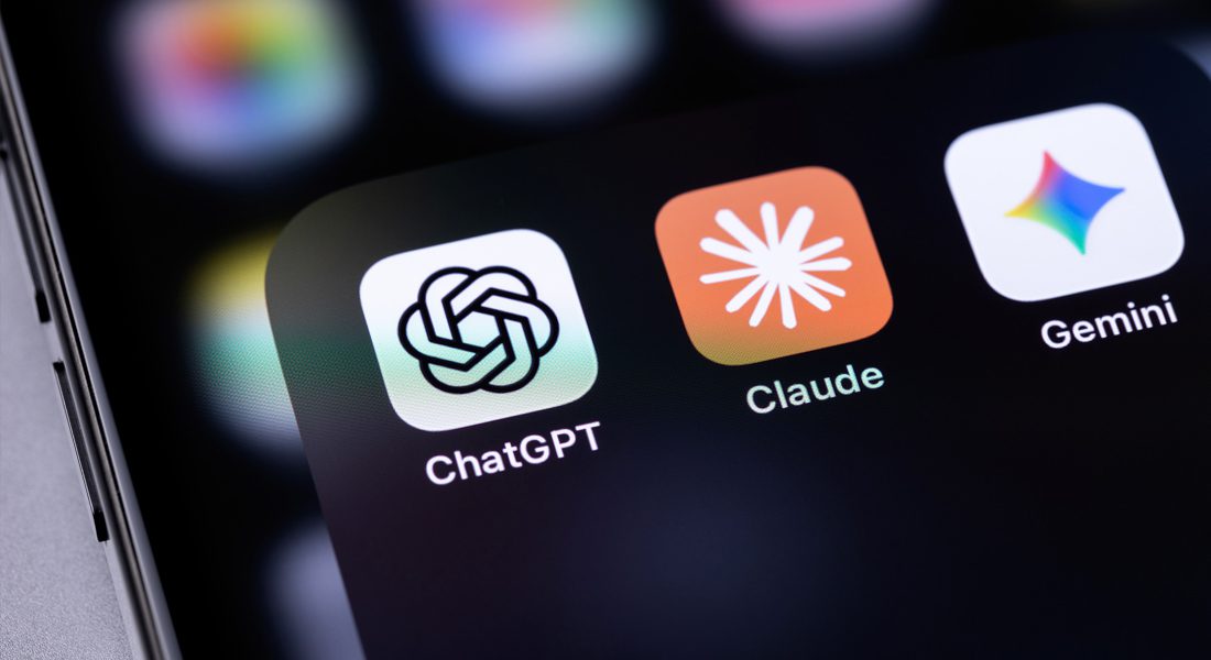 Smart phone with app icons for ChatGPT, Claude and Gemini